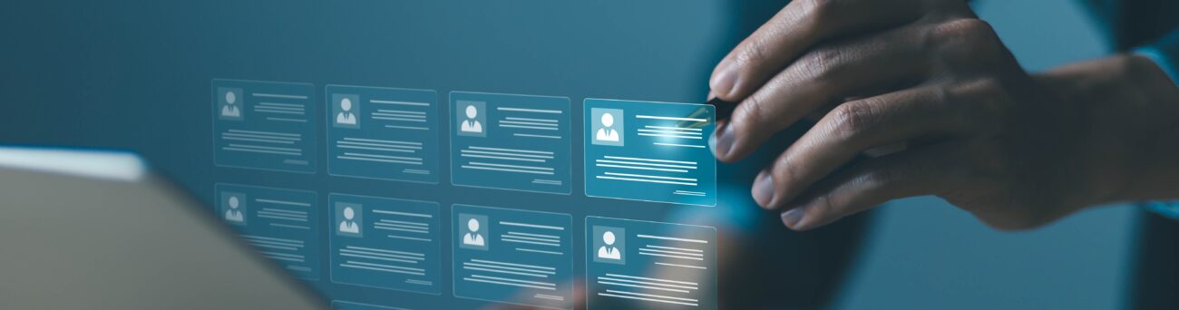 Professional IT recruiting agency specializing in tech staffing for contracts and placements — image of a recruiter selecting a candidate.